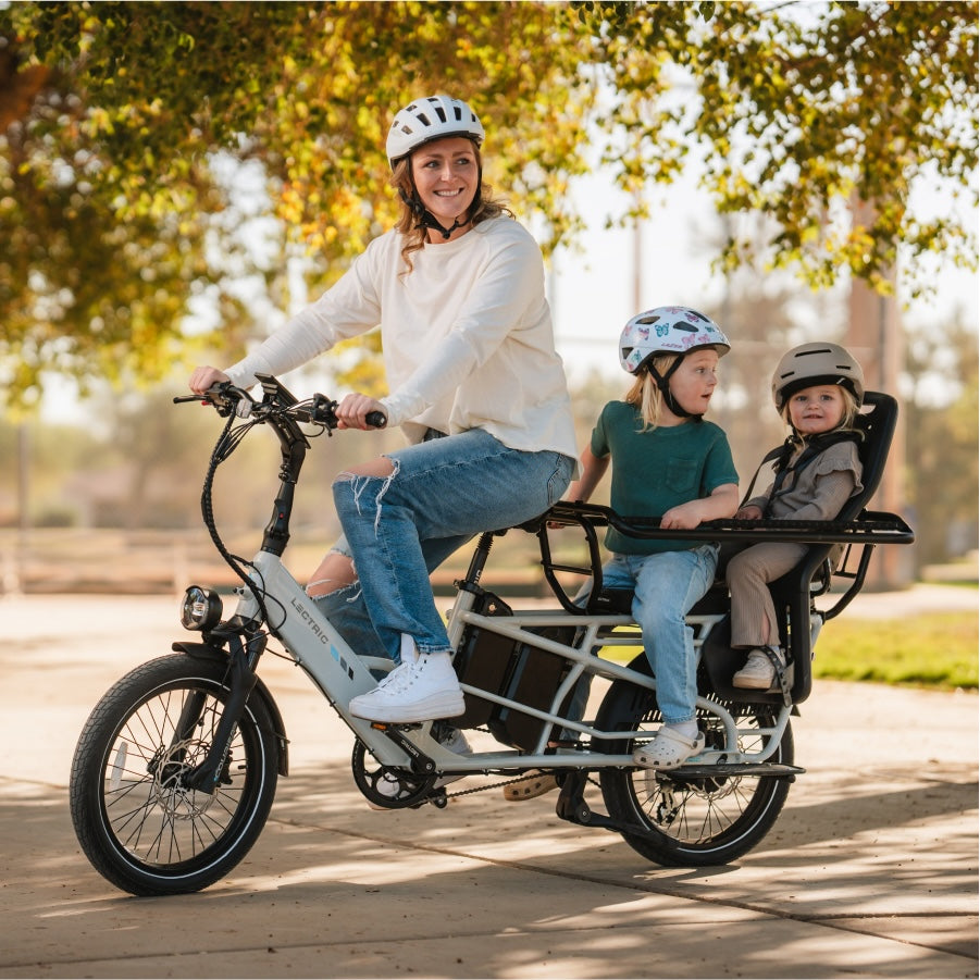 Rider using a Lectric XPedition2 with two passengers