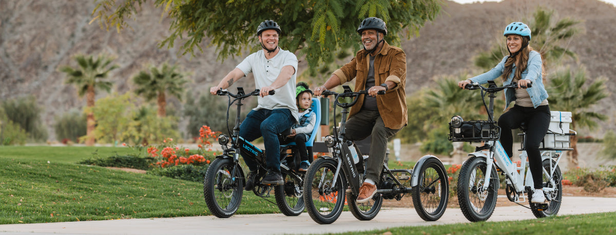 Three adults riding Lectric XP 3.0 and a Lectric XP Trike