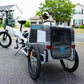 cute puppy in wag-along pet trailer attached to xp lite ebike