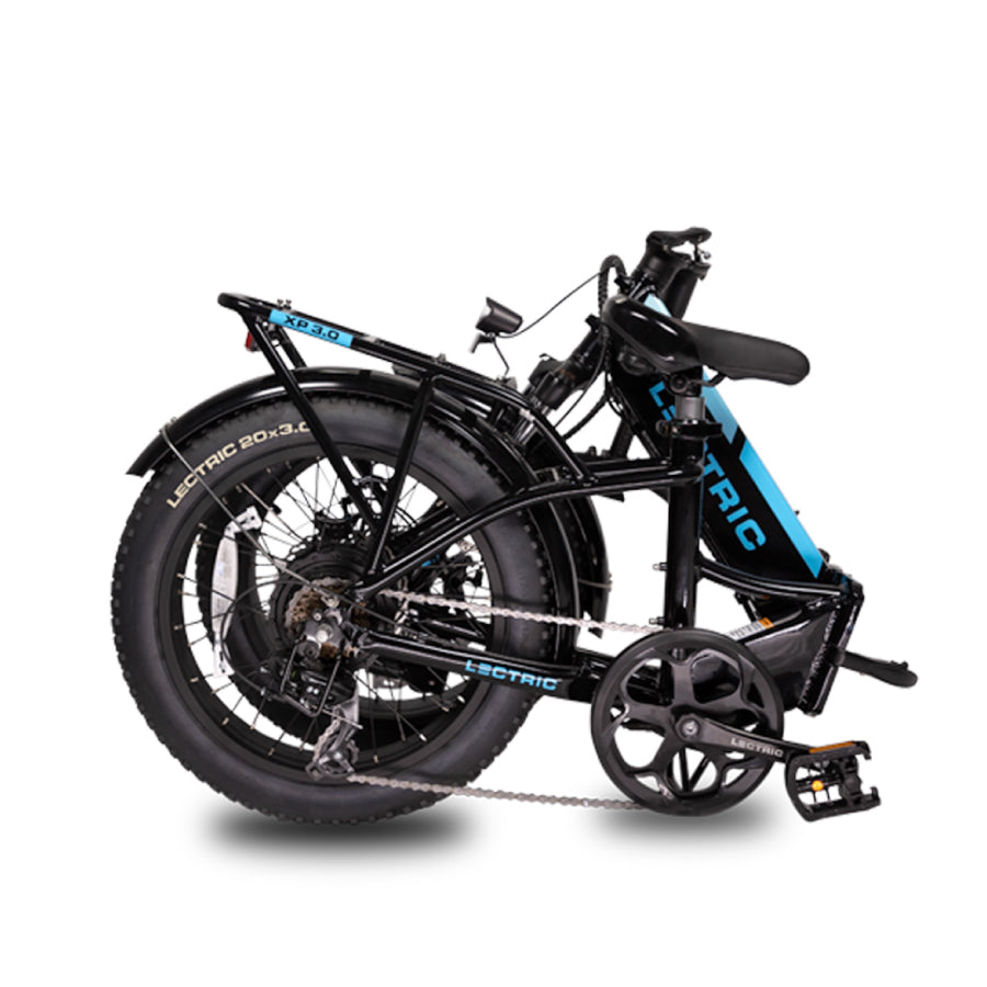 Black electric bike folded at the center frame and handlebar stem on white background