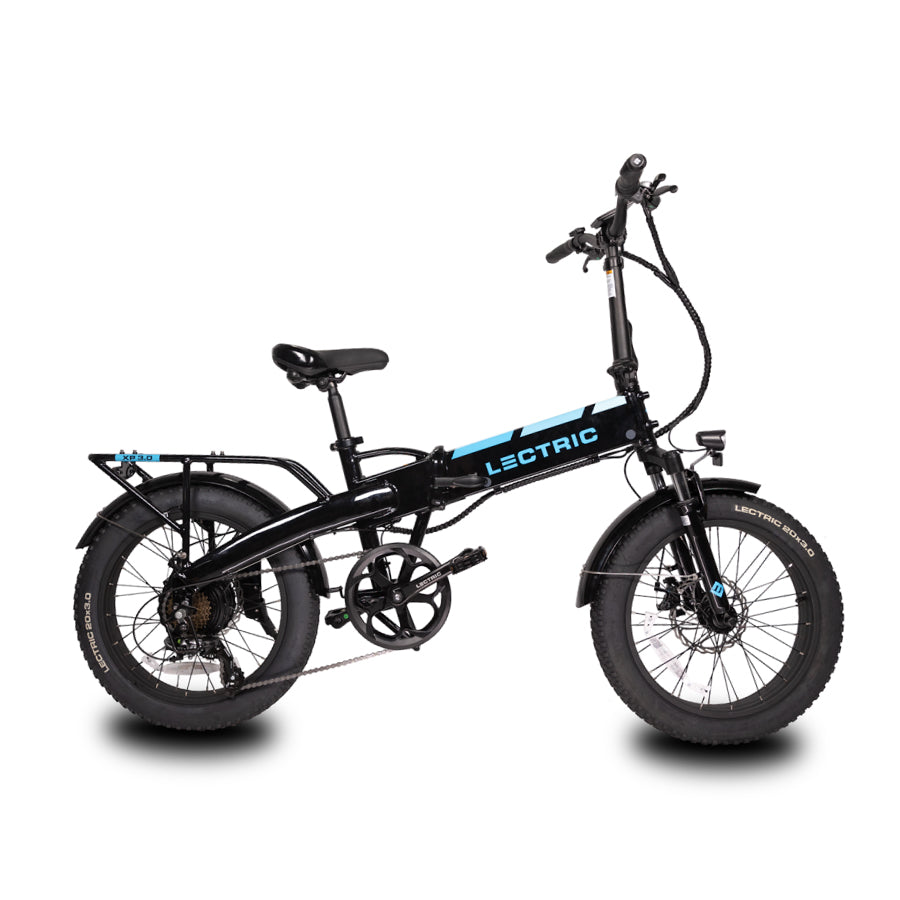 Black electric bike with an integrated rear rack and LCD Display on white background