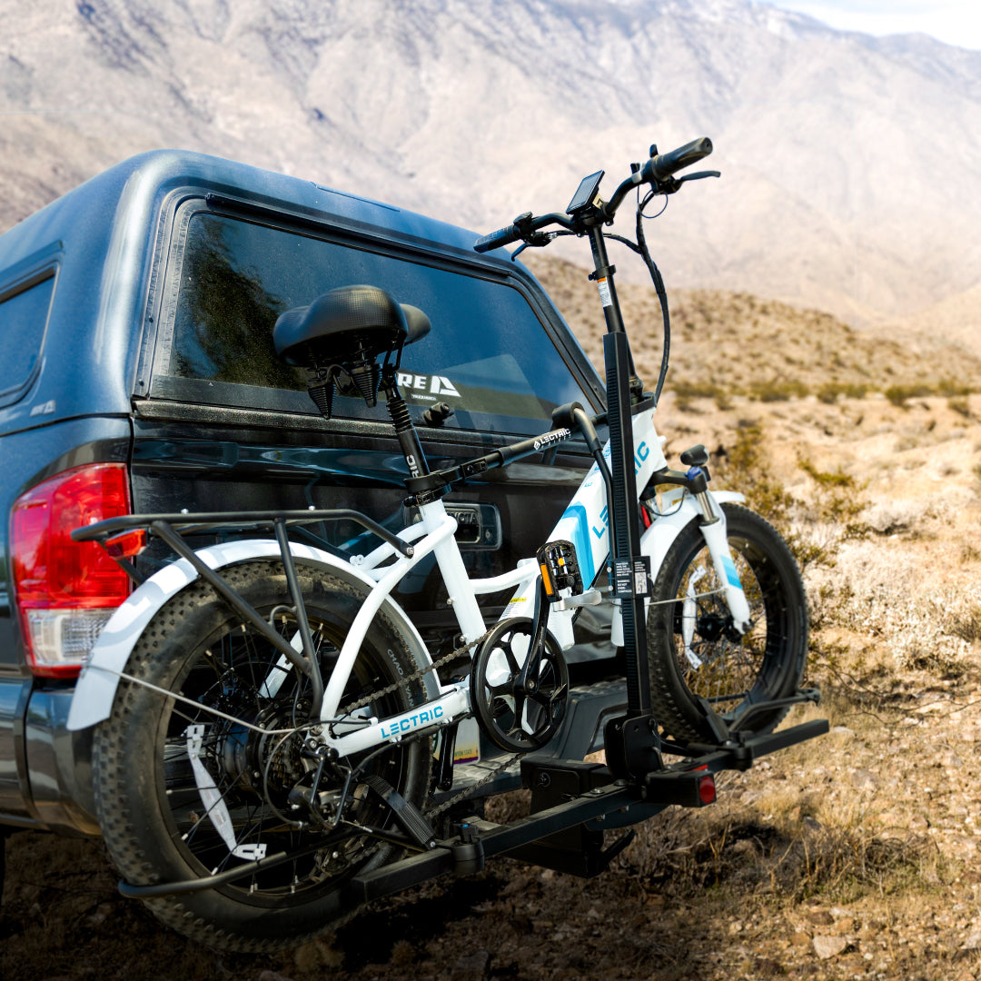 xp ebike mounted on back of truck in desert