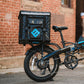 LARGE FOOD DELIVERY PACKAGE ON REAR RACK OF 3.0 XP BLACK